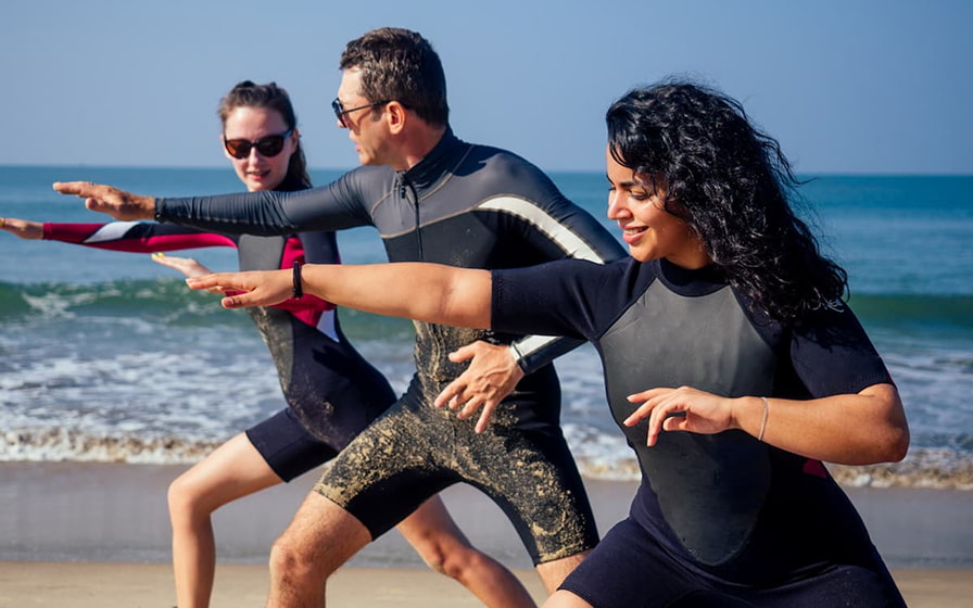 Adaptive surfing apprentices at Playa de muro