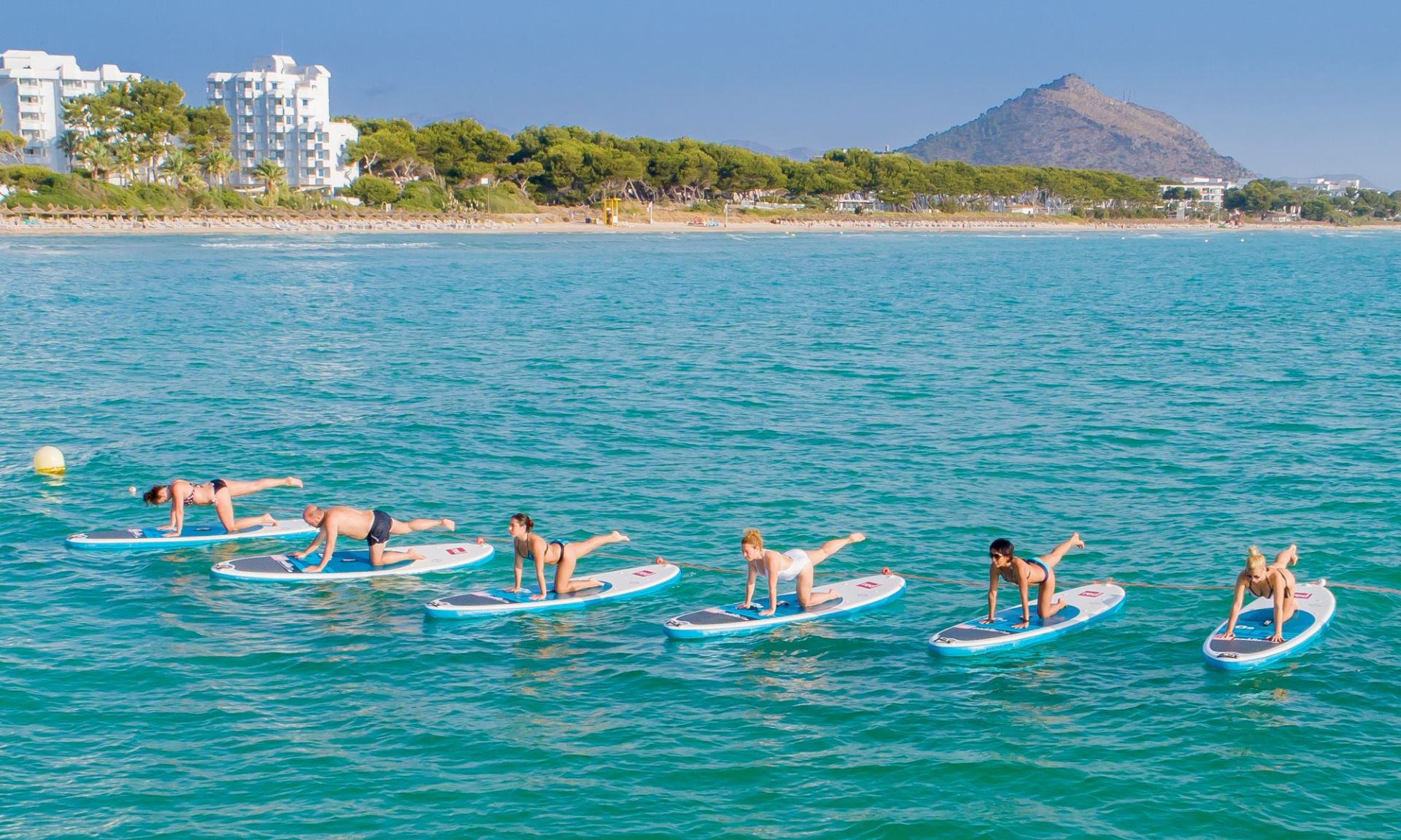 Yoga en Paddle Surf en Playa de Muro